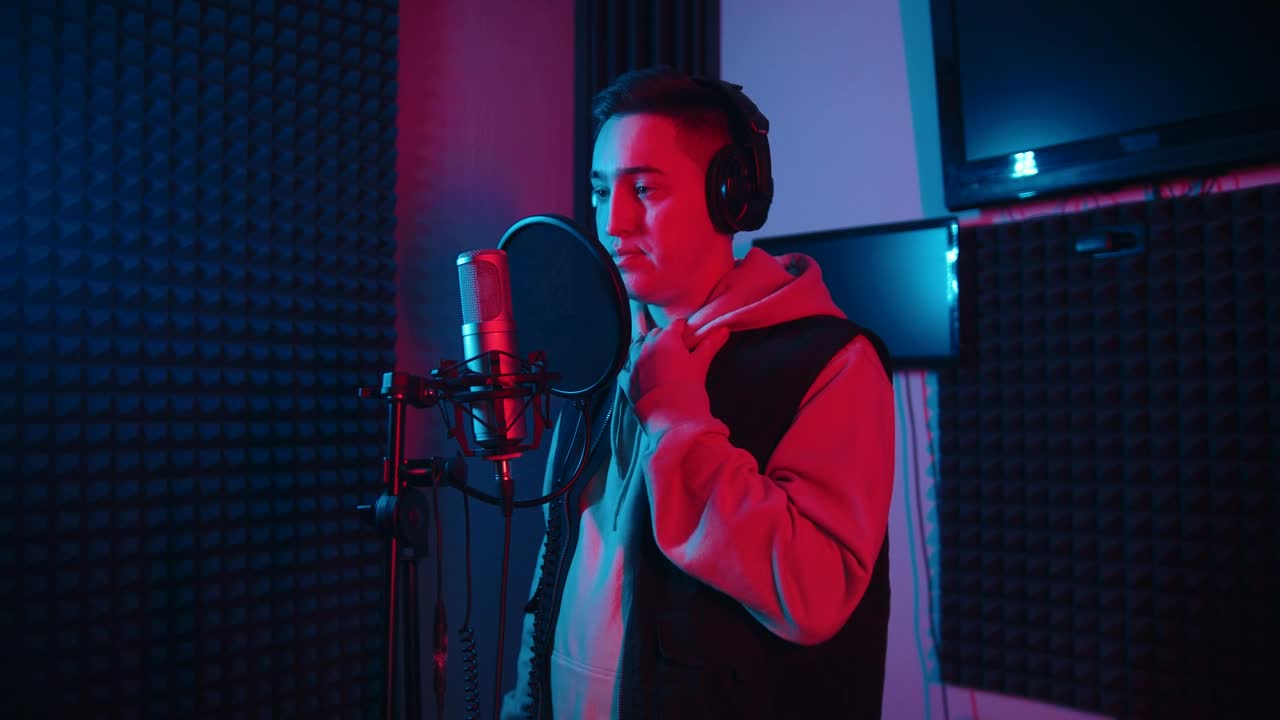 Download Stock Video A Man Singing In The Recording Studio Live Wallpaper For PC