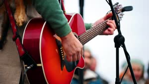 Stock Video A Man Playing The Guitar On Stage In A Festival Live Wallpaper For PC