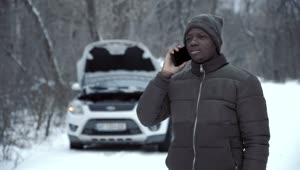 Stock Video A Man Calling Car Insurance For A Broken Car Live Wallpaper For PC