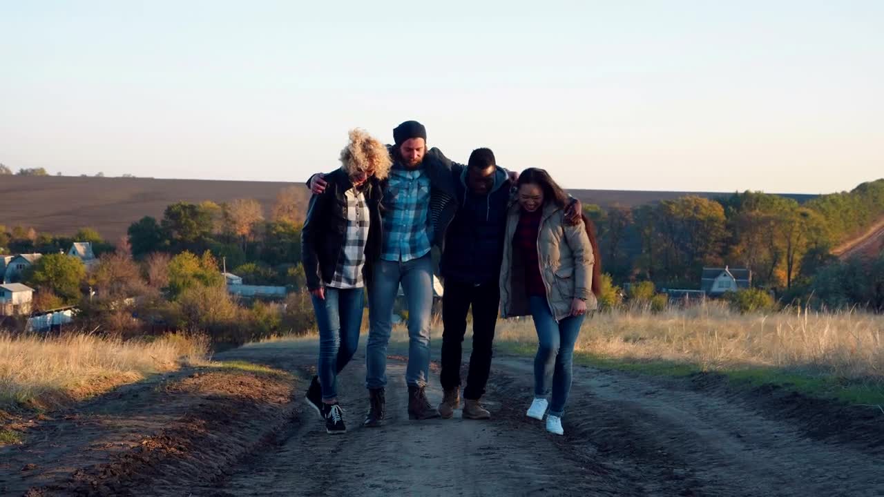 Download Stock Video A Group Of Friends Hugging And Walking On A Path Live Wallpaper For PC