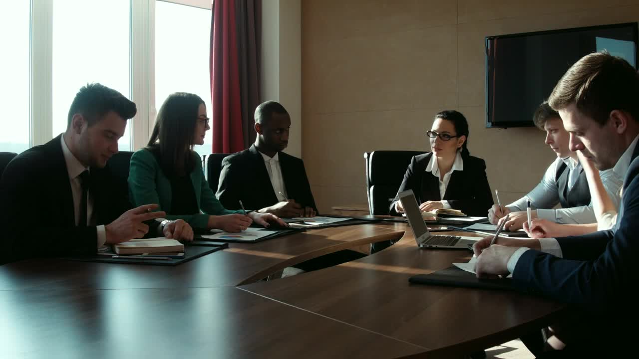 Download Stock Video A Group Of Businessmen In A Conference Room Live Wallpaper For PC