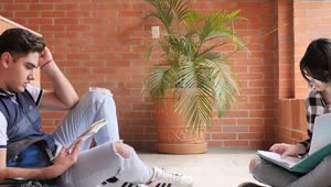 Stock Video A Girl And A Boy Studying Together In The Corridors Live Wallpaper For PC