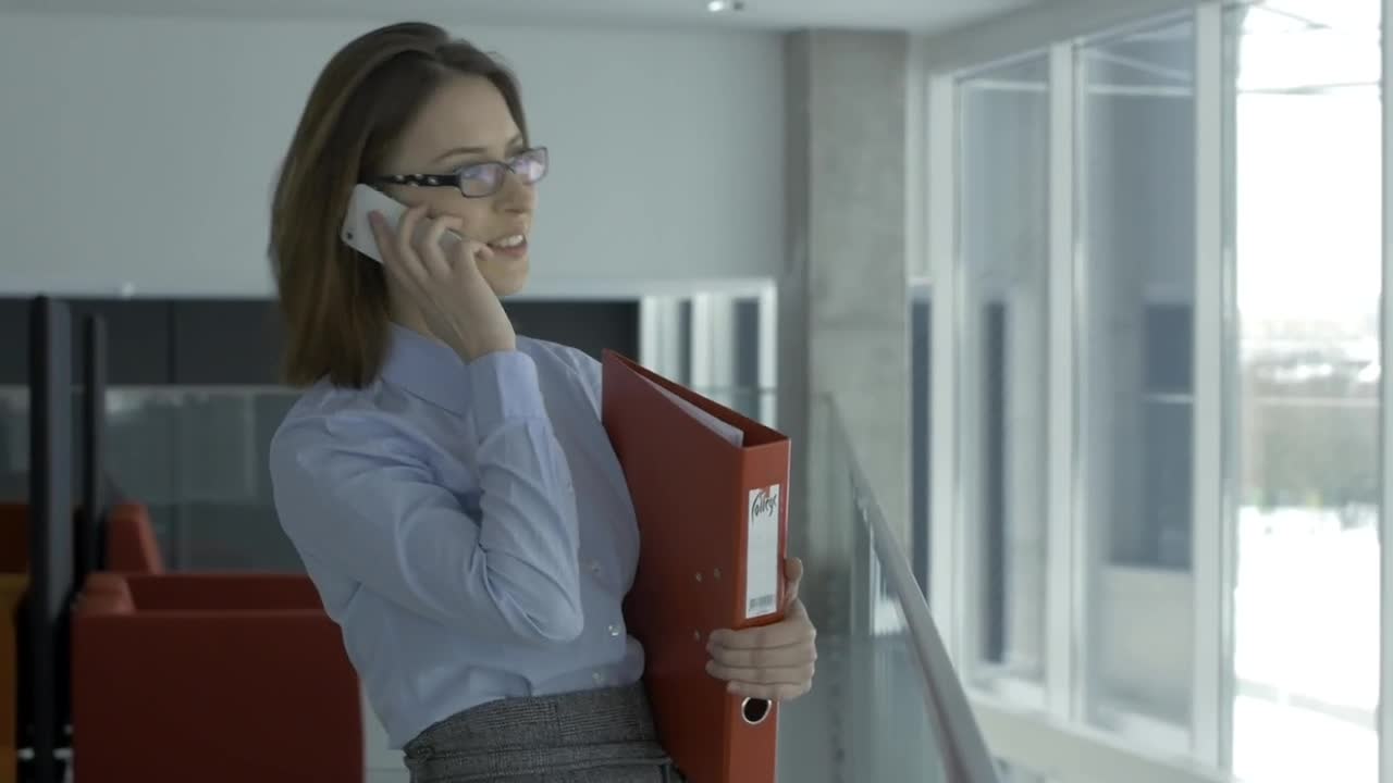 Download Stock Video Business Woman Talking On The Phone In The Office Live Wallpaper For PC