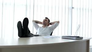 Stock Video Business Man Reclines In Chair And Thinks Live Wallpaper For PC