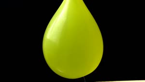Stock Video Bursting A Yellow Water Balloon Live Wallpaper For PC