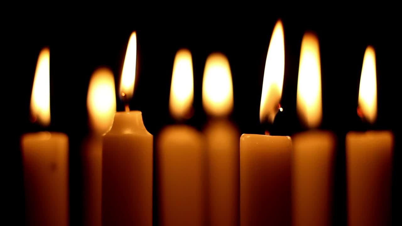 Download Stock Video Burning Candles In The Dark Close Up Live Wallpaper For PC