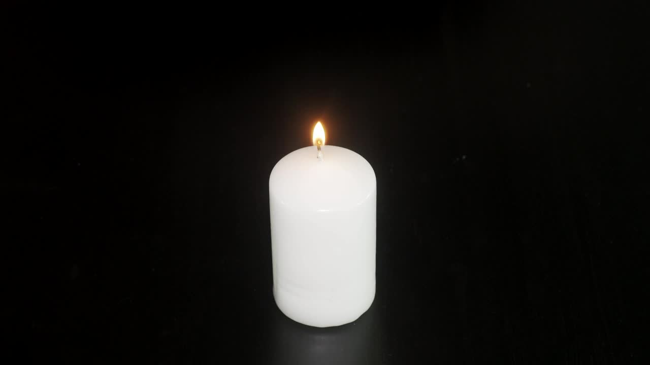 Download Stock Video Burning Candle Against A Dark Background Live Wallpaper For PC