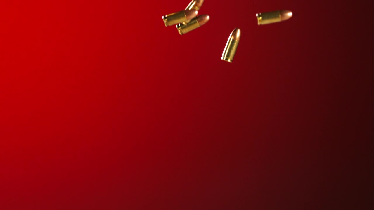 Download Stock Video Bullets Falling And Bouncing In A Red Background Live Wallpaper For PC