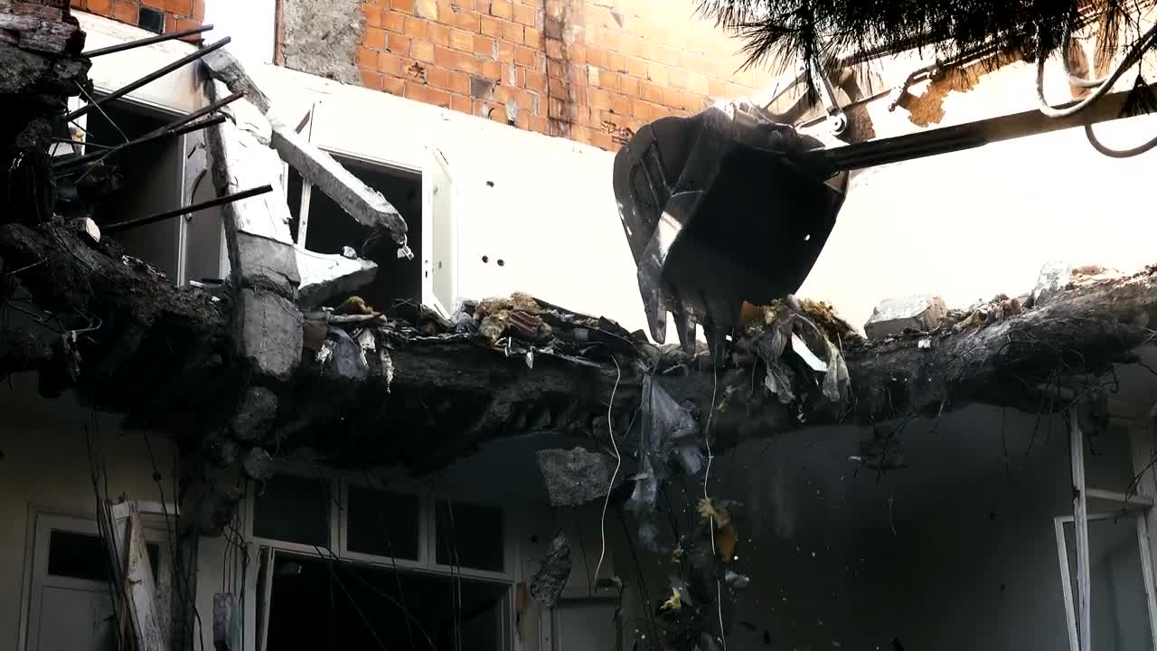 Download Stock Video Bulldozer Knocking Down A Ruined Building Live Wallpaper For PC