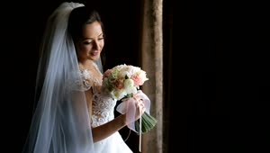 Stock Video Bride In Wedding Dress Holding Flower Bouquet On Black Background Live Wallpaper For PC