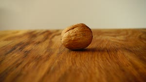 Stock Video Breaking A Walnut With Hammer Live Wallpaper For PC