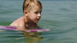 Stock Video Boy Swimming With A Board Live Wallpaper For PC