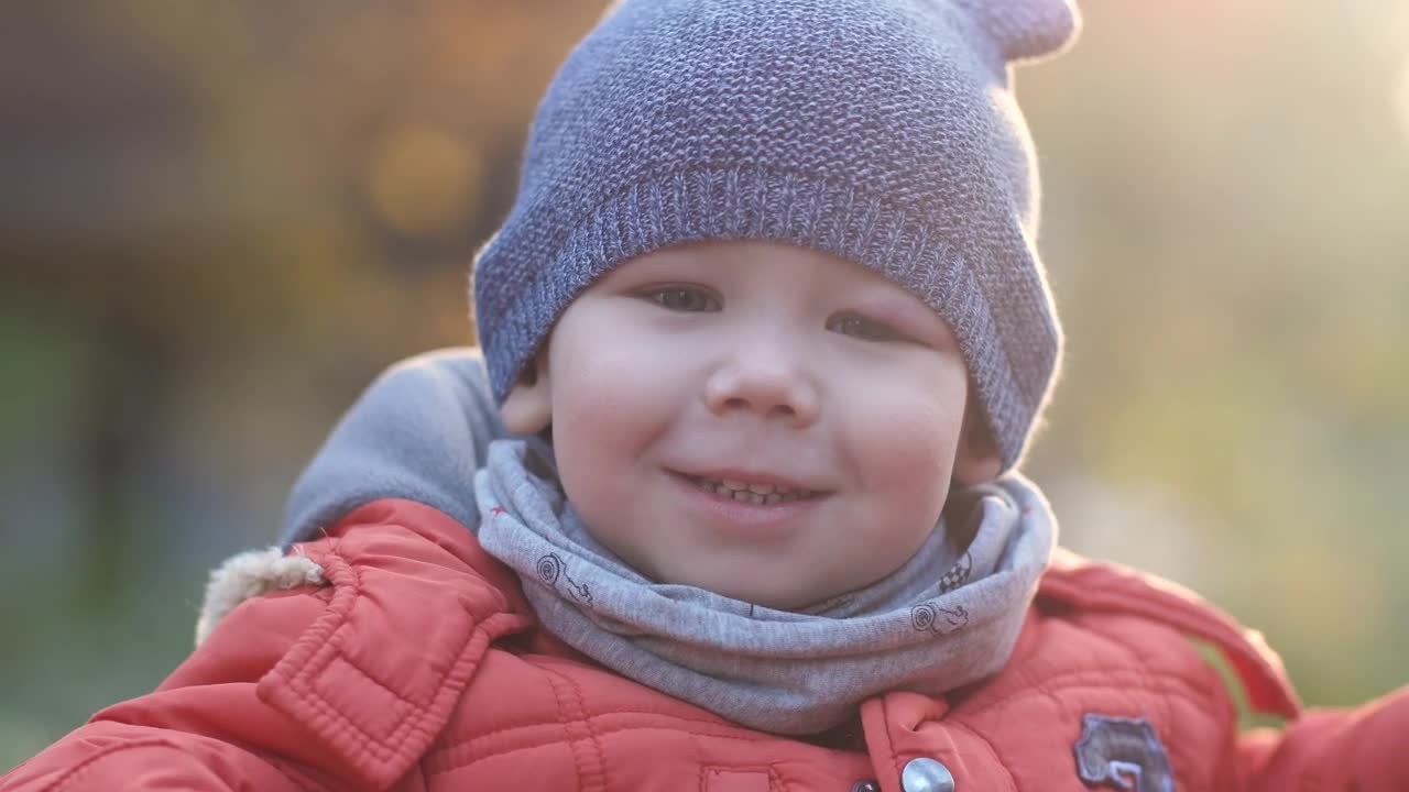 Download Stock Video Boy Smiling At The Camera On A Cold Day Live Wallpaper For PC