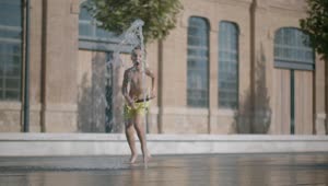 Stock Video Boy Running Across A City Fountain Live Wallpaper For PC