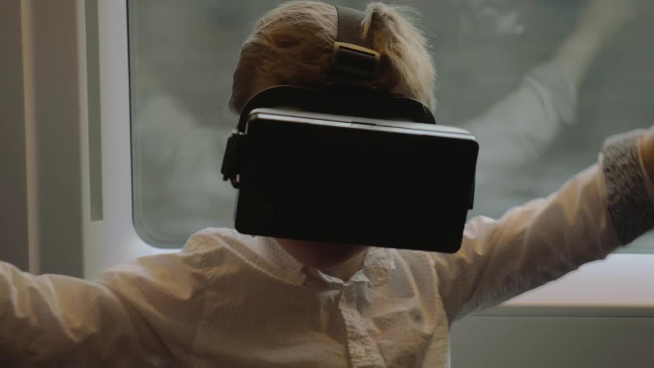 Download Stock Video Boy Playing With Vr Glasses On A Trip Live Wallpaper For PC