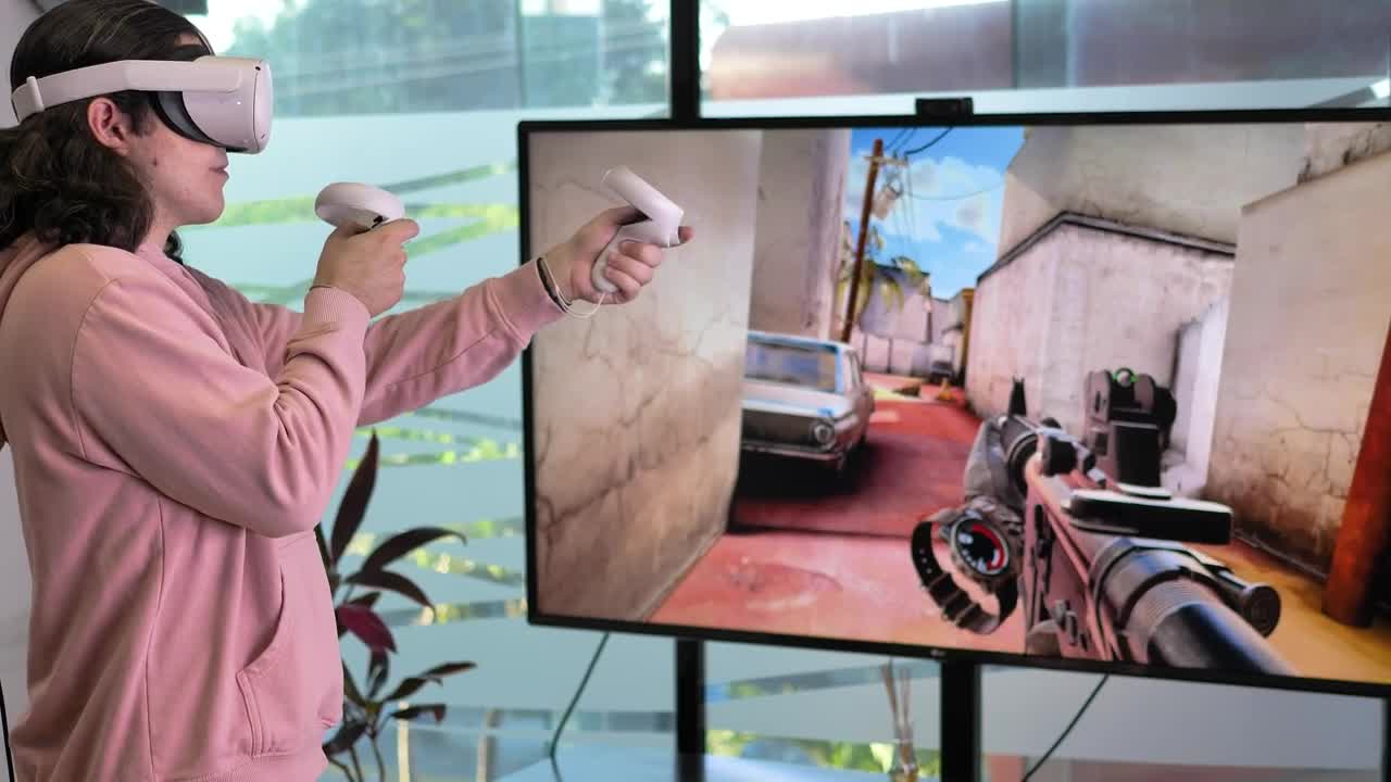 Download Stock Video Boy Playing A Vr Shooting Game Live Wallpaper For PC