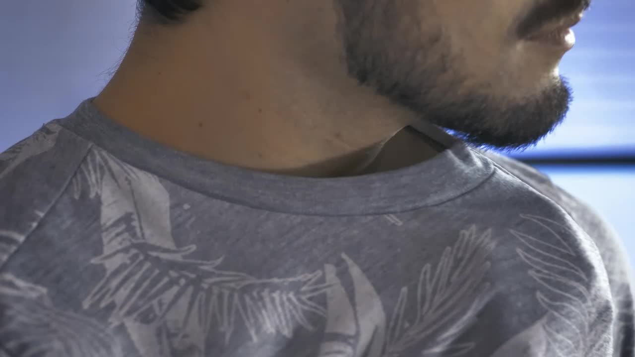 Download Stock Video Boy Placing A Lapel Microphone On His Shirt Live Wallpaper For PC