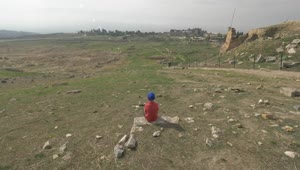 Stock Video Boy Looking Out Over City Ruins Live Wallpaper For PC