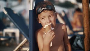 Stock Video Boy Eating An Ice Cream While On Holiday Live Wallpaper For PC