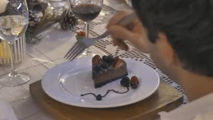 Stock Video Boy Eating A Slice Of Cake At Christmas Dinner Live Wallpaper For PC