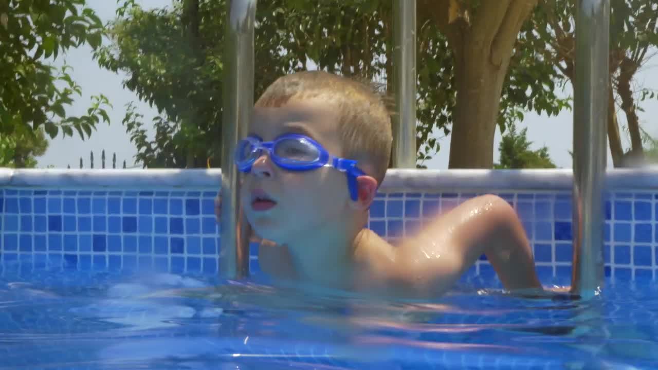 Download Stock Video Boy Climbing Into A Pool Live Wallpaper For PC