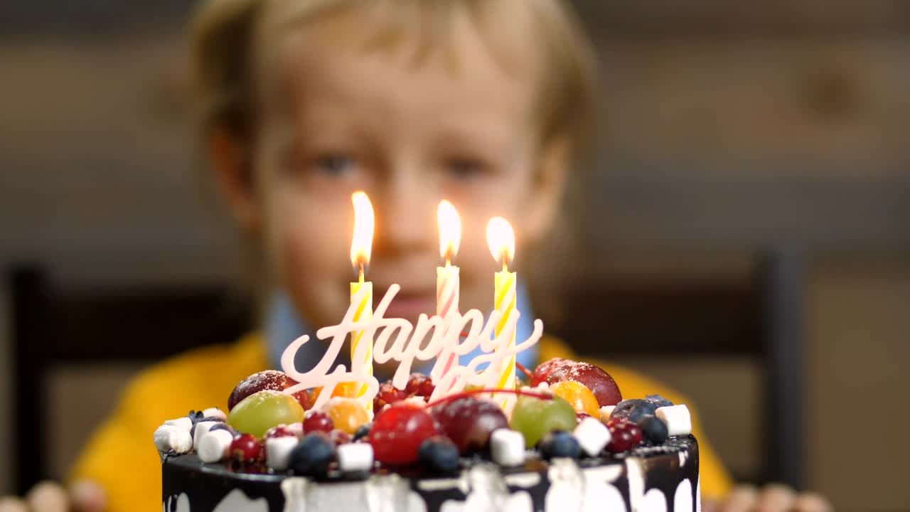 Download Stock Video Boy Blowing Out Candles On A Cake Live Wallpaper For PC