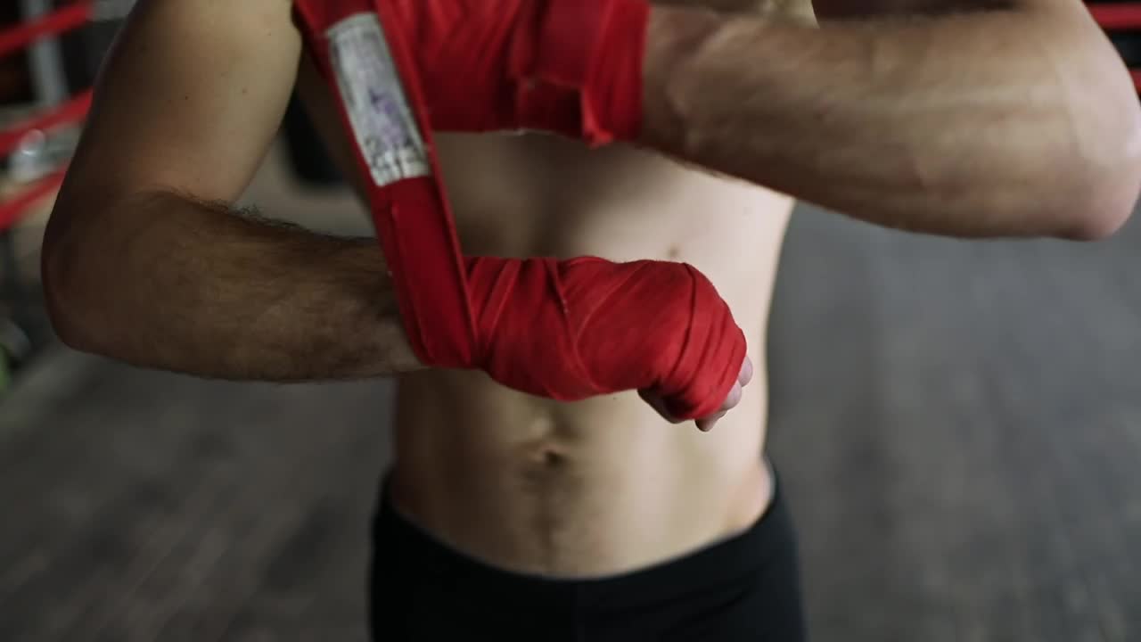 Download Stock Video Boxer Wraps Hands To Prepare For Training Live Wallpaper For PC
