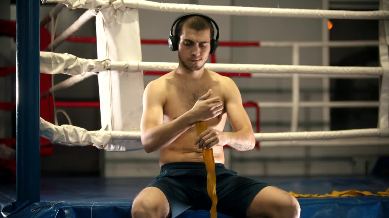 Download Stock Video Boxer Preparing For His Training Next To The Ring Live Wallpaper For PC
