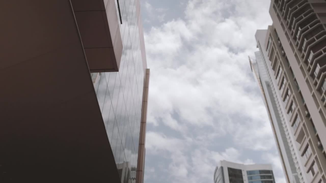 Download Stock Video Bottom Shot Of Cityscape With Clouds Live Wallpaper For PC