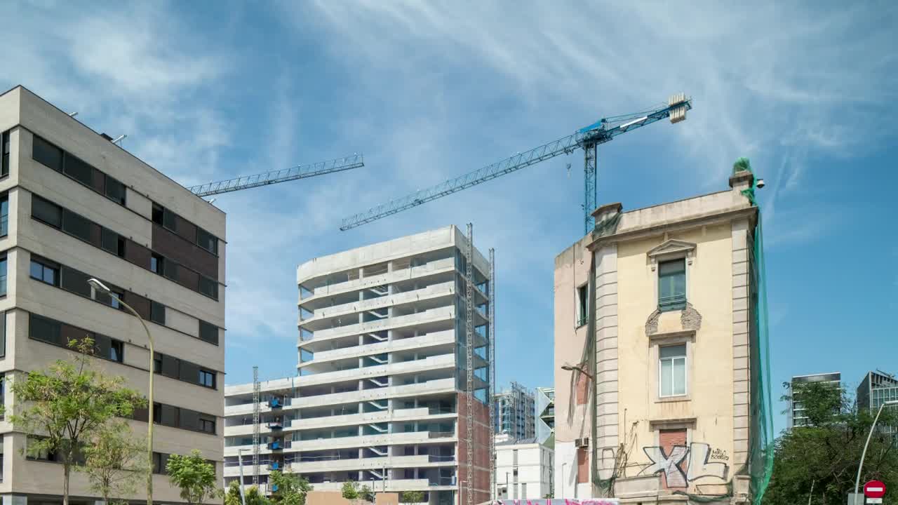 Download Stock Video Bottom Shot Of City Buildings And Cranes Live Wallpaper For PC