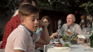 Stock Video Bored Boy On A Family Dinner Live Wallpaper For PC