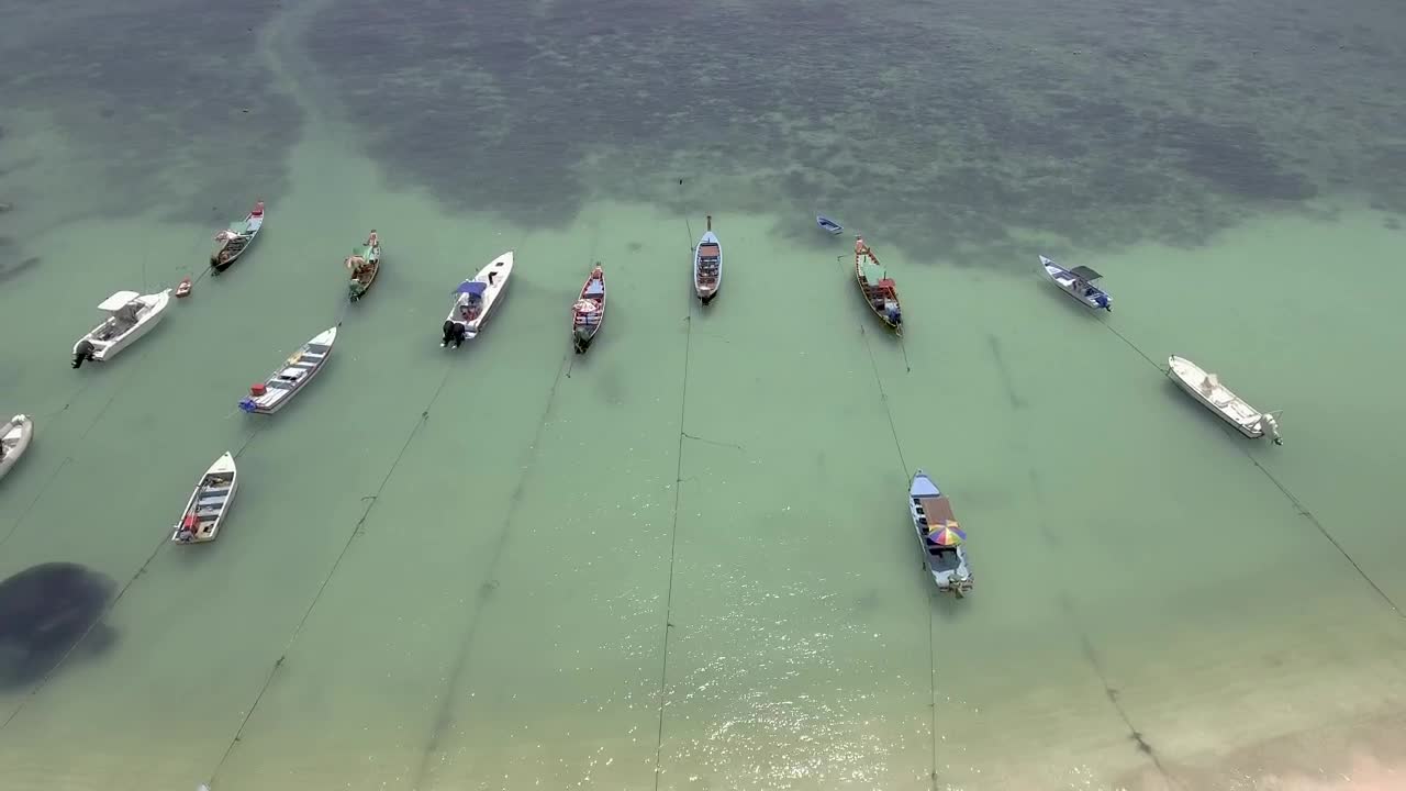Download Stock Video Boats Tied Up Near A Paradisiacal Beach From Above Live Wallpaper For PC