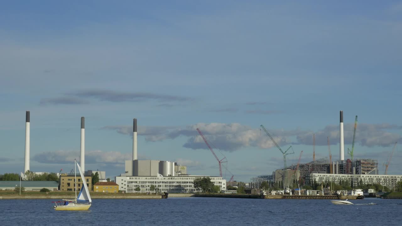 Download Stock Video Boats Heading Past An Industrial Port Live Wallpaper For PC