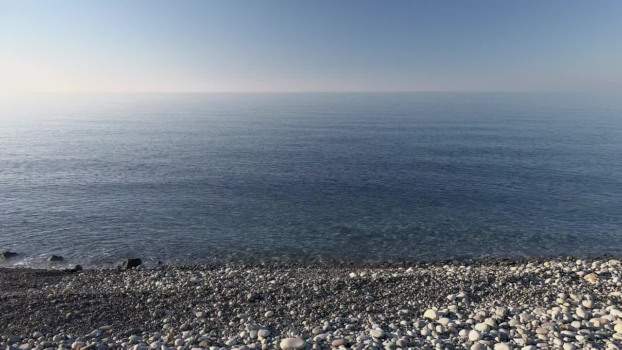 Download Stock Video Boat Sailing In A Calm Sea Near The Rocky Beach Live Wallpaper For PC