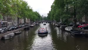 Stock Video Boat Crossing The Canal In Amsterdam Live Wallpaper For PC