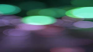 Stock Video Blurred Green And Purple Lights Bokeh Live Wallpaper For PC