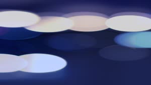 Stock Video Blurred Circular Lights On Blue Live Wallpaper For PC