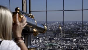 Stock Video Blonde Woman Using A Telescope In Eiffel Tower Live Wallpaper For PC