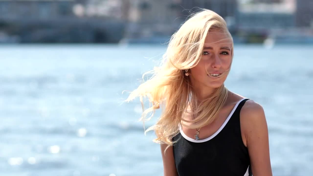 Download Stock Video Blonde Woman Posing On A Beach Live Wallpaper For PC