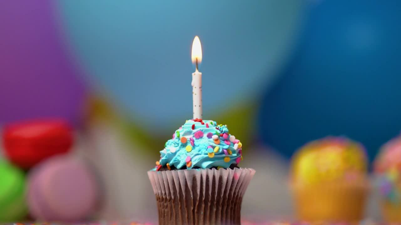 Download Stock Video Birthday Muffin With A Burning Candle Live Wallpaper For PC