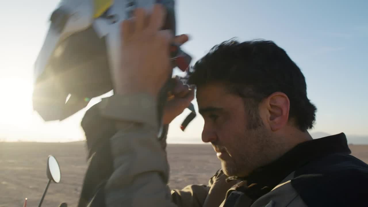 Download Stock Video Biker Putting On His Helmet Live Wallpaper For PC