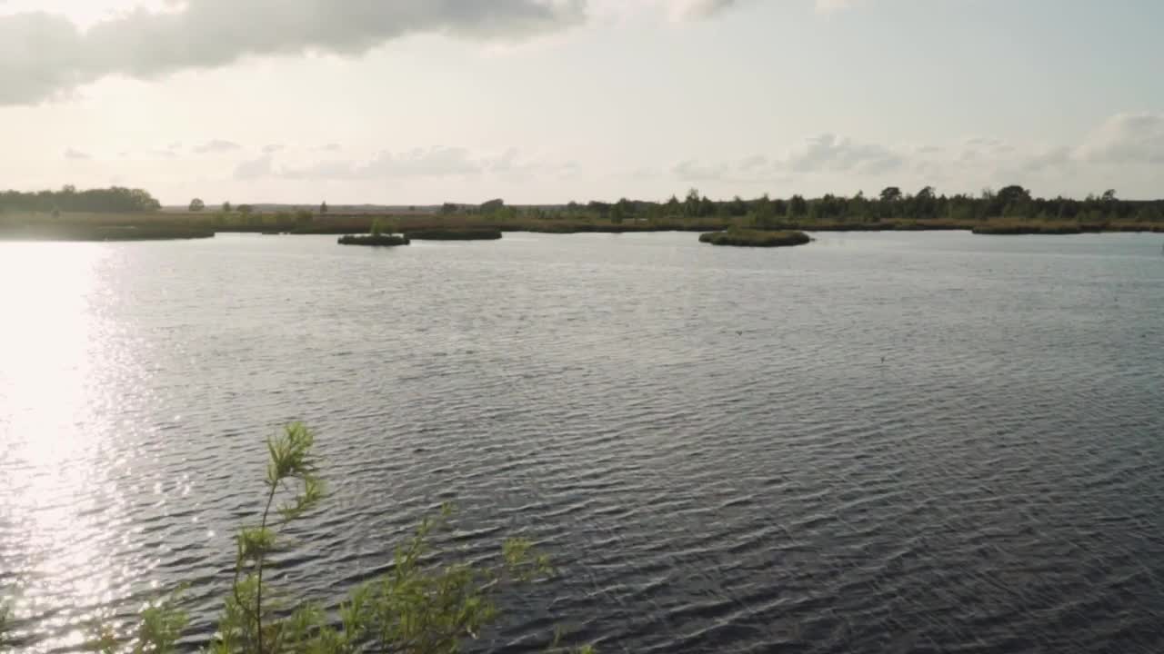 Download Stock Video Big Lake Reflecting Sunlight Live Wallpaper For PC