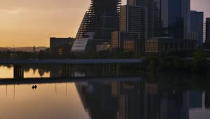 Stock Video Big City Of Tall Buildings At Sunset From A Lake Live Wallpaper For PC