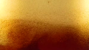 Stock Video Beer Foam Forming In A Glass Seen From Close Up Live Wallpaper For PC