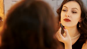 Stock Video Beautiful Woman Applies Red Lipstick In Mirror Live Wallpaper For PC