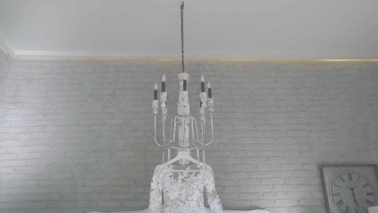 Download Stock Video Beautiful Wedding Dress Hanging In A White Room Live Wallpaper For PC