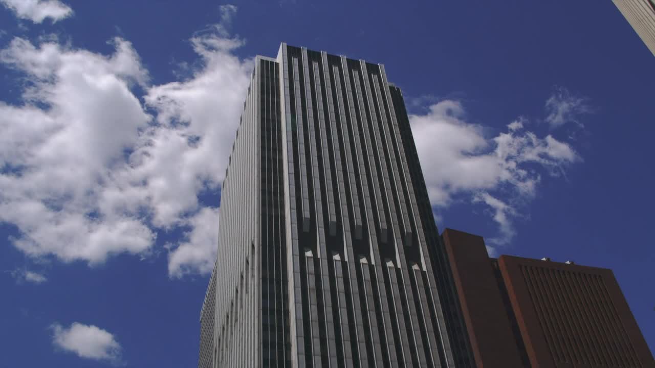 Download Video Stock Clouds Behind A Skyscraper Live Wallpaper For PC