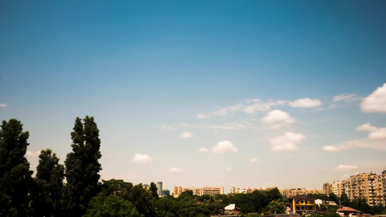 Download Video Stock Clouds Above A Town Skyline Live Wallpaper For PC