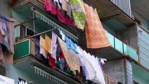 Video Stock Clothes Hanging On A Multi Story Building Live Wallpaper For PC