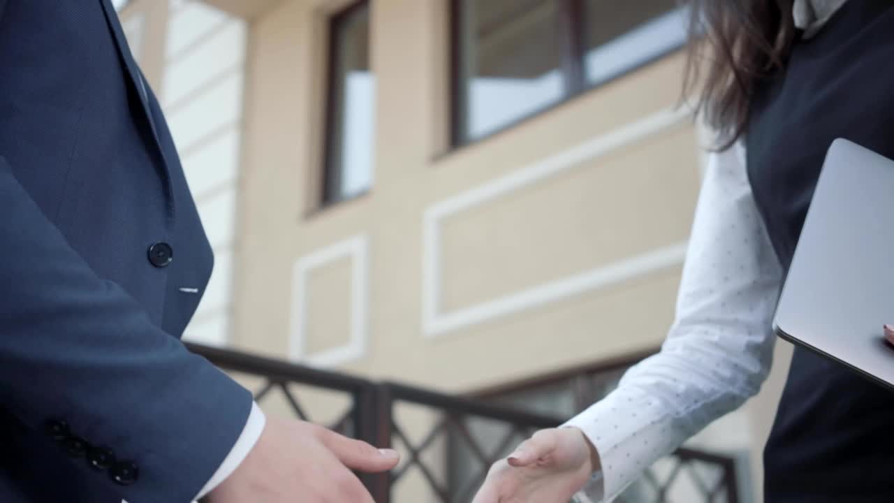 Download Video Stock Closeup Of Business People Shaking Hands Outside Live Wallpaper For PC
